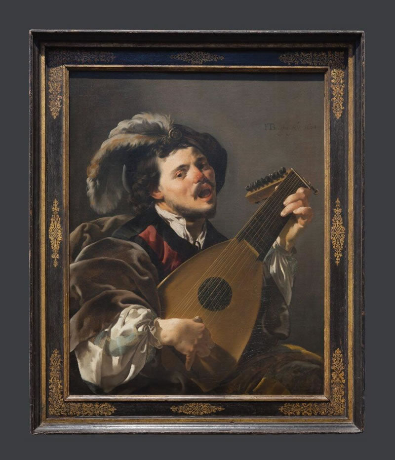A Man playing a Lute