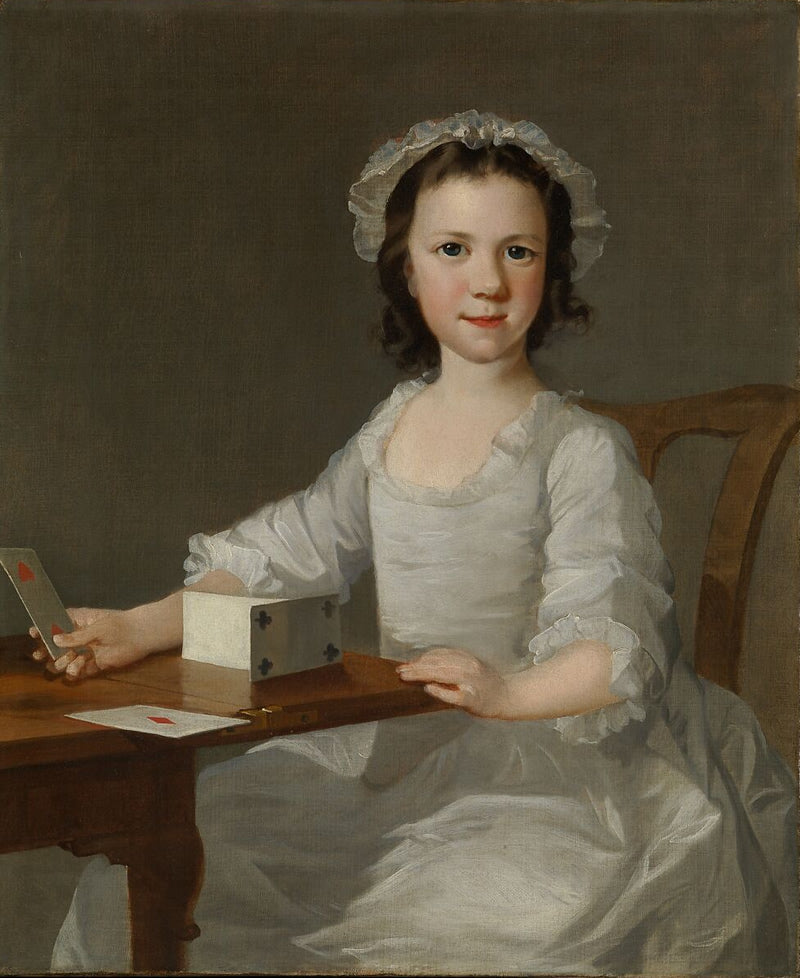 Girl Building a House of Cards