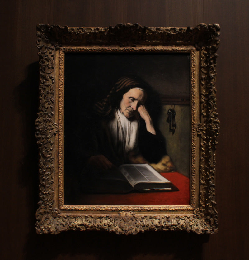 An Old Woman Dozing over a Book
