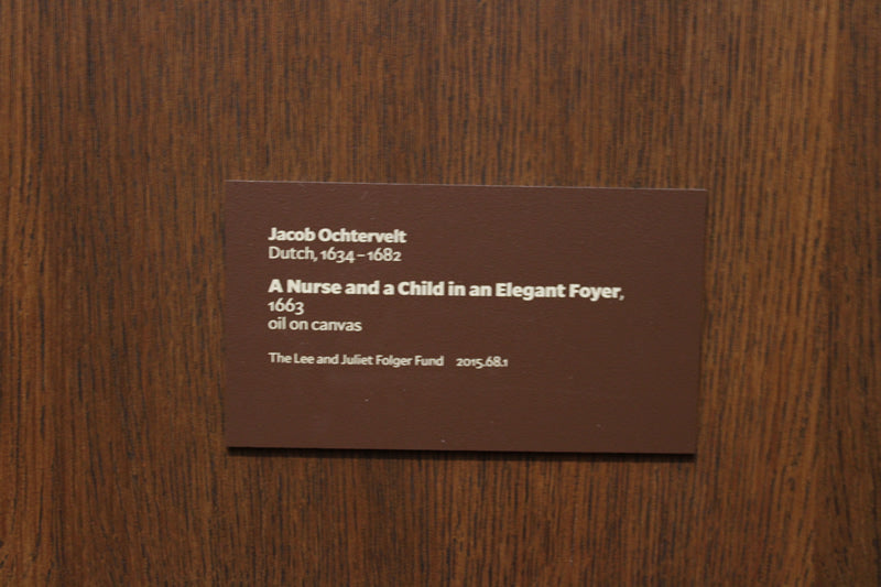 A Nurse and a Child in an Elegant Foyer