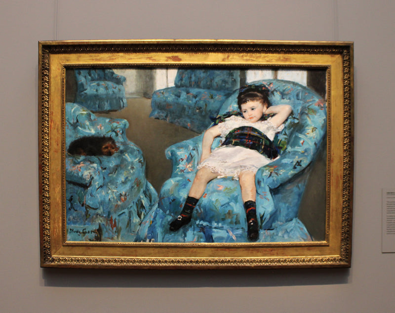 Little Girl in a Blue Armchair