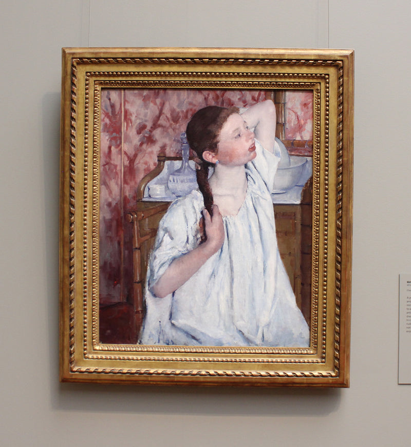 Girl Arranging Her Hair