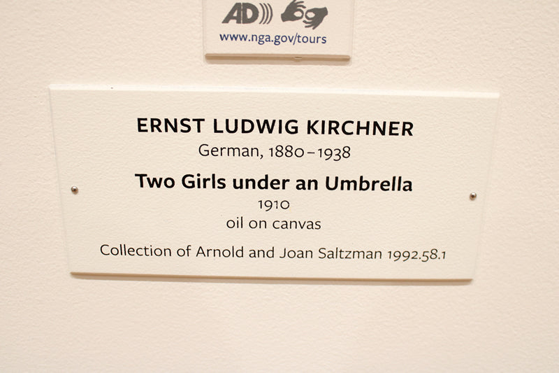 Two Girls under an Umbrella