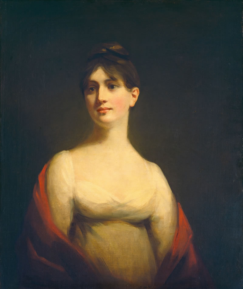 Portrait of a woman with a red shawl draped over her shoulders against a dark background