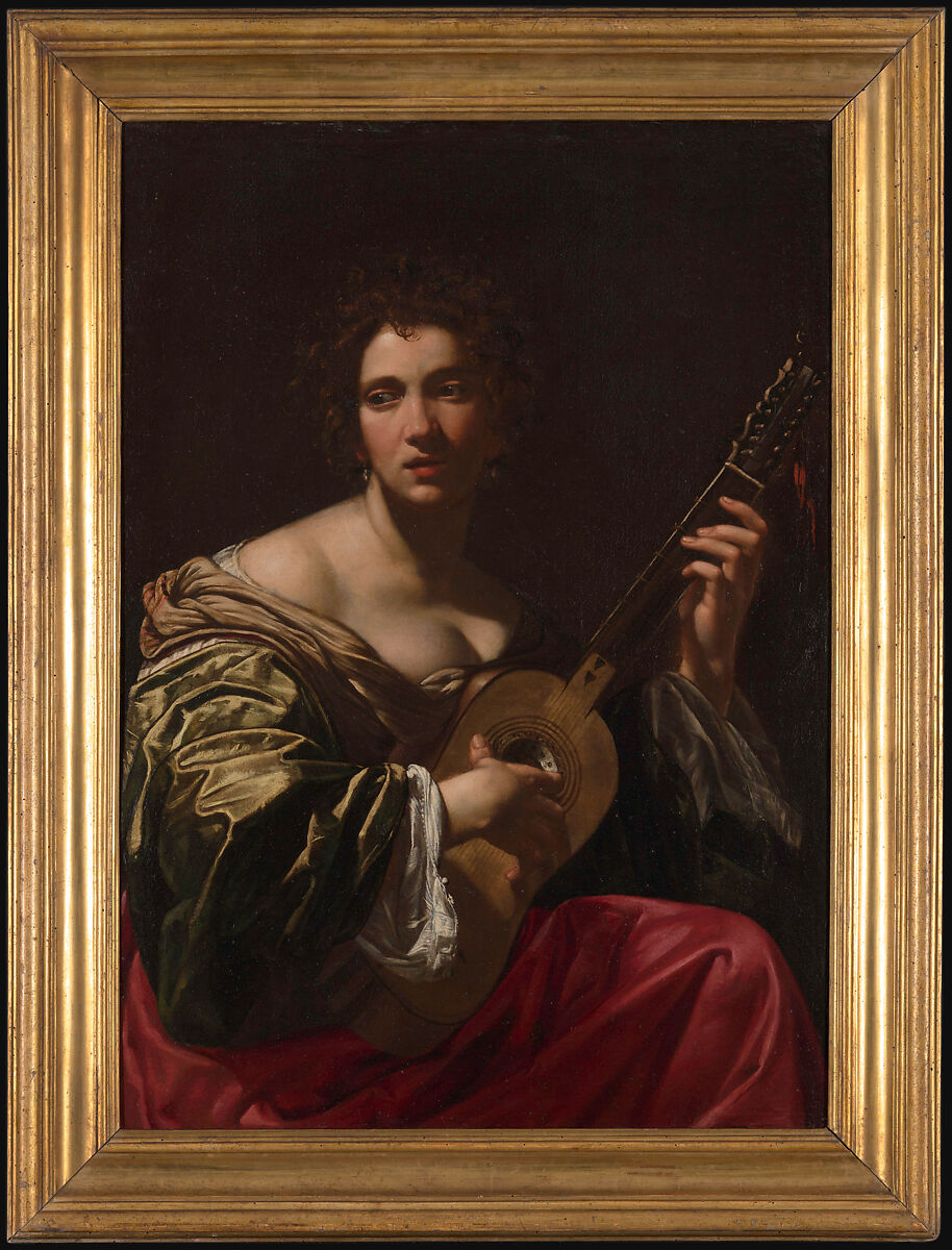 Woman Playing a Guitar