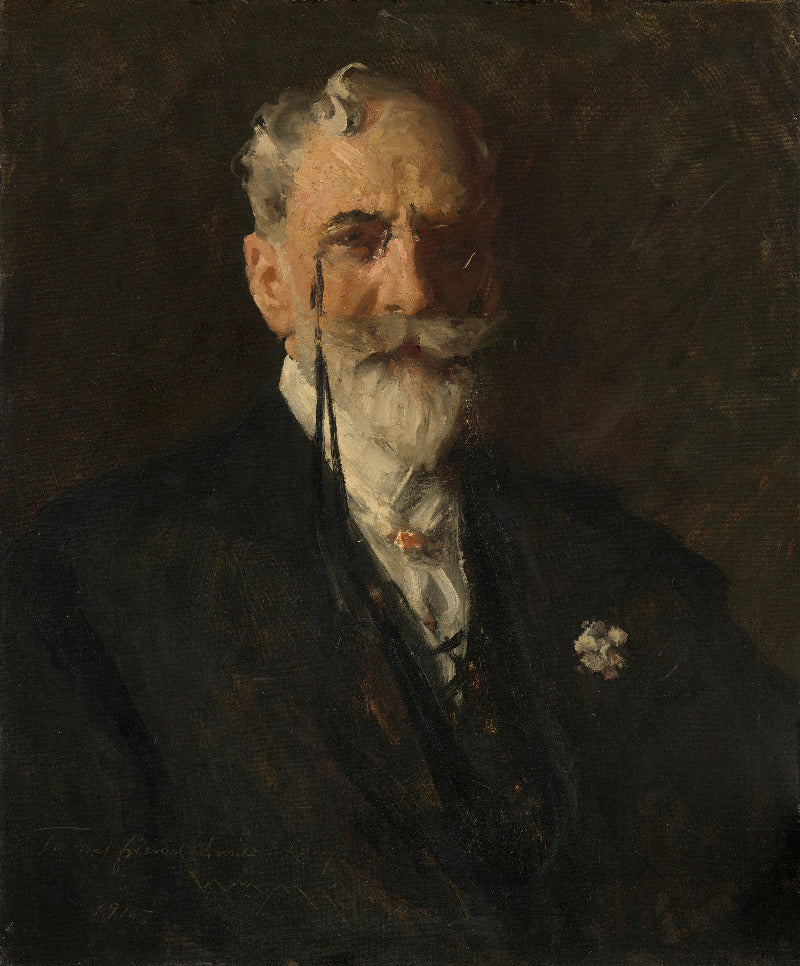 Portrait of a man with a white beard wearing a dark suit against a dark background